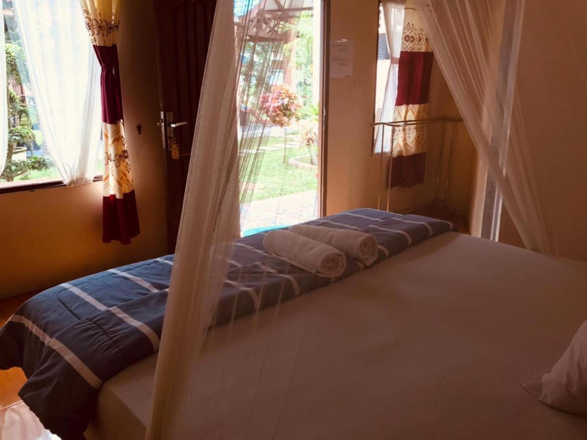 Thomas' Retreat Bukit Lawang Hotel ภายนอก รูปภาพ